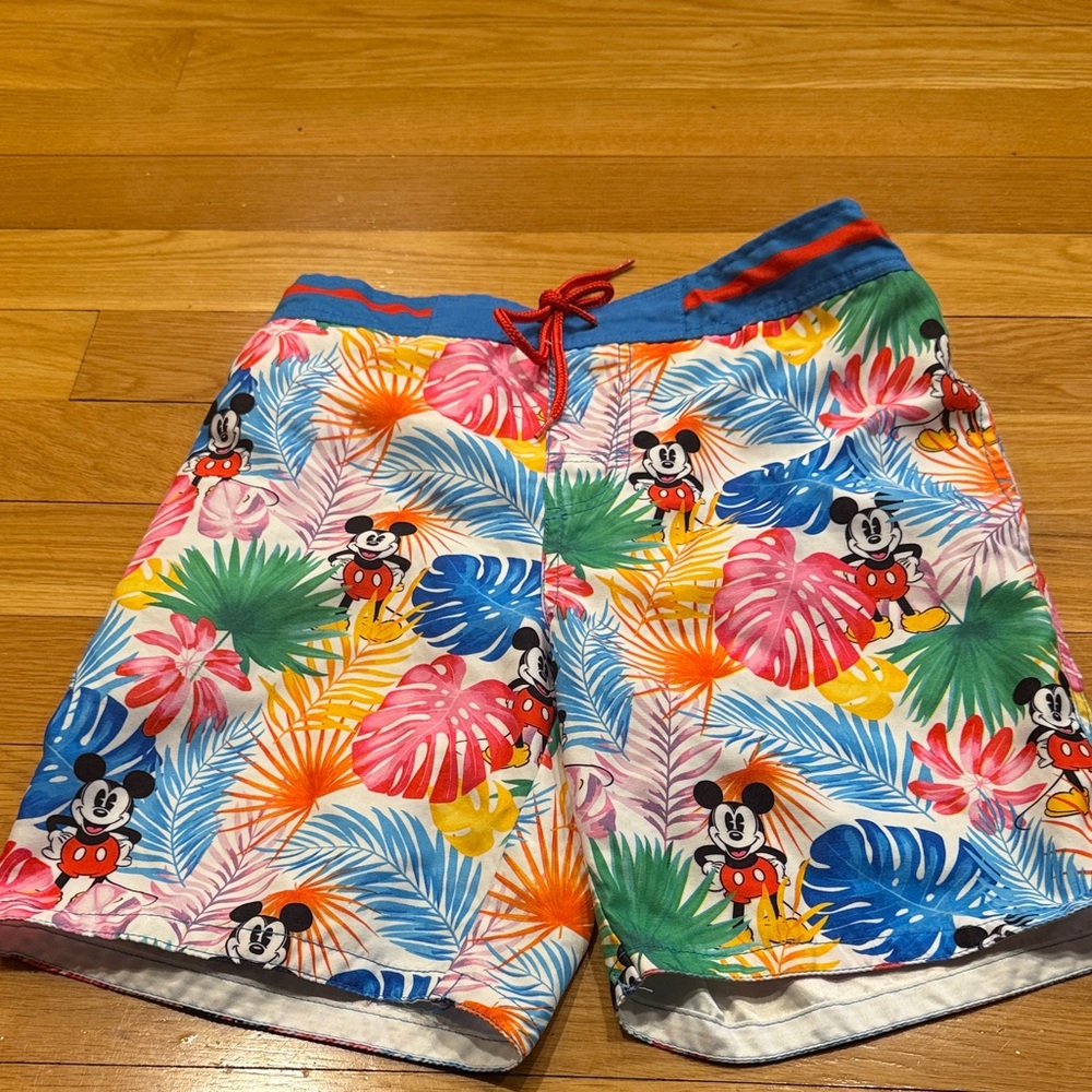 Disney store men’s swim shorts size small ,